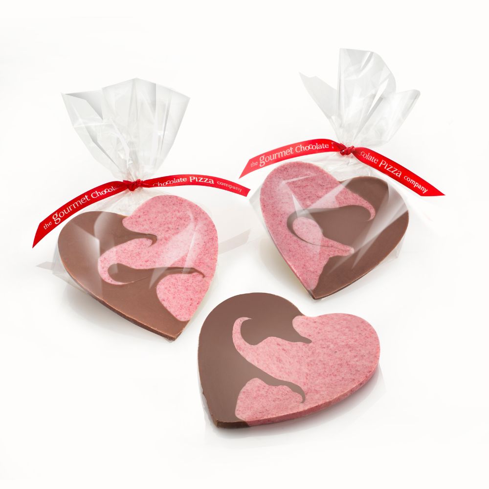 Chocolate hearts with milk chocolate and raspberry white chocolate. Individually sealed in clear plastic bags and handtied with red ribbon.